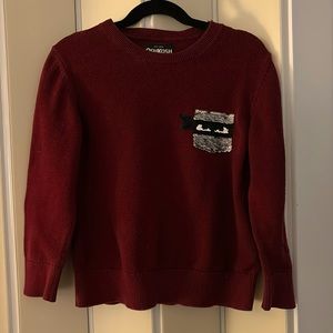 Oshkosh B’gosh maroon sweater with sequins change ninja, size 7